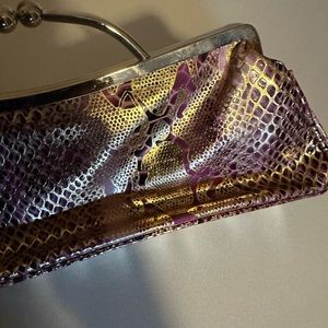 Faux snake skin clutch